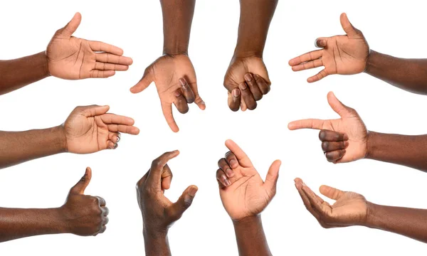 Afro-Amerikaanse man met verschillende gebaren op witte achtergrond, close-up weergave van de handen — Stockfoto