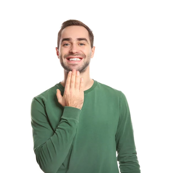 Чоловік показує жест у жестовій мові на білому тлі — стокове фото
