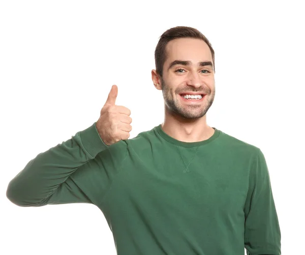 Man menampilkan gestur THUMB UP dalam bahasa isyarat di latar belakang putih — Stok Foto