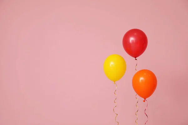 Bright balloons on color background, space for text. Celebration time — Stock Photo, Image