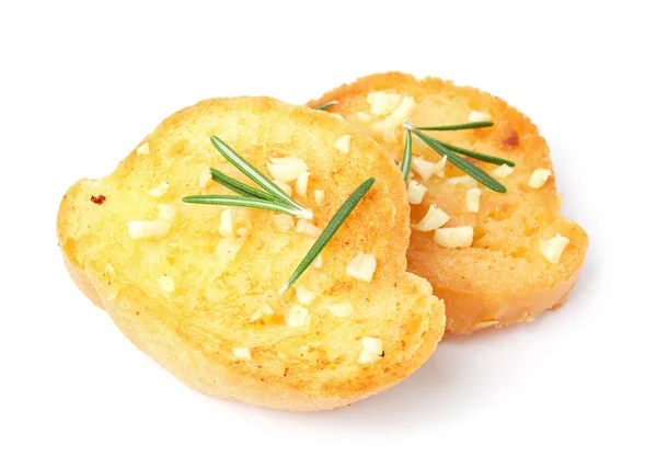 Beyaz üzerinde izole otlar ile lezzetli sarımsak ekmek dilimleri — Stok fotoğraf