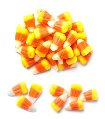 Beyaz arka planda Cadılar Bayramı partisi için renkli şeker Mısır seti