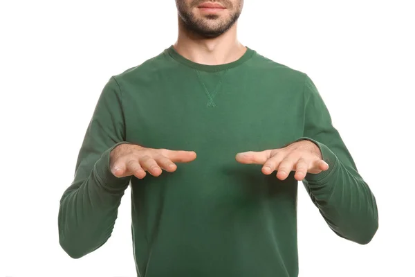 Mann zeigt Segensgeste in Gebärdensprache auf weißem Hintergrund, Nahaufnahme — Stockfoto