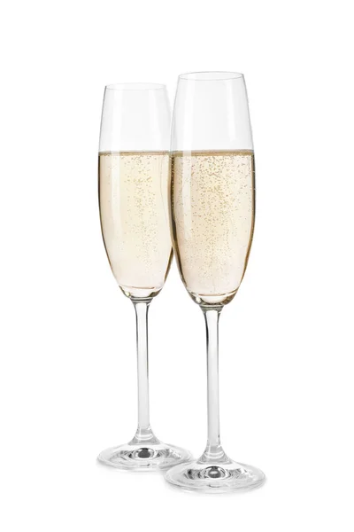 Glas champagne på vit bakgrund. Festlig dryck — Stockfoto