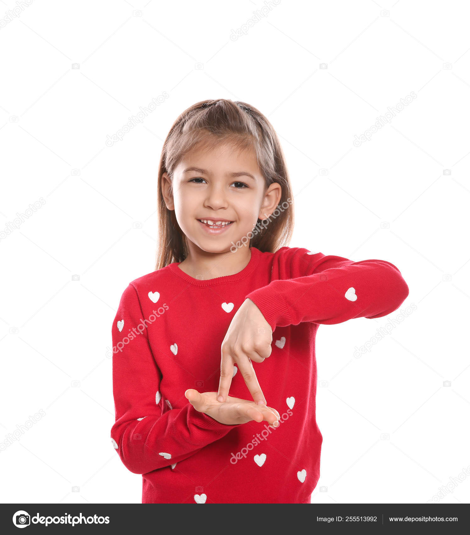 Little girl showing STAND gesture in sign language on white background