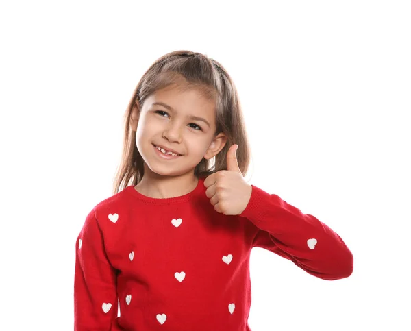 Petite fille montrant THUMB UP geste en langue des signes sur fond blanc — Photo