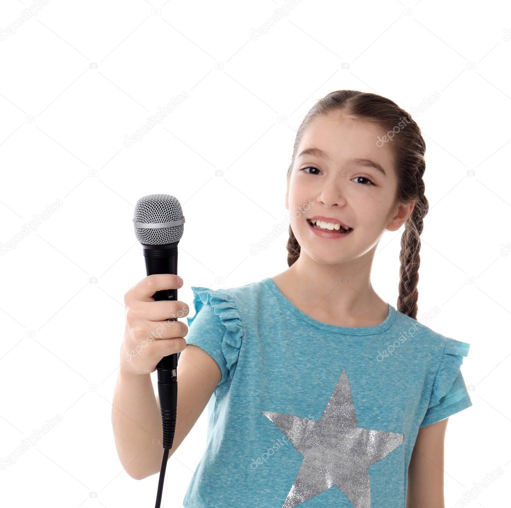 Cute girl with microphone on white background