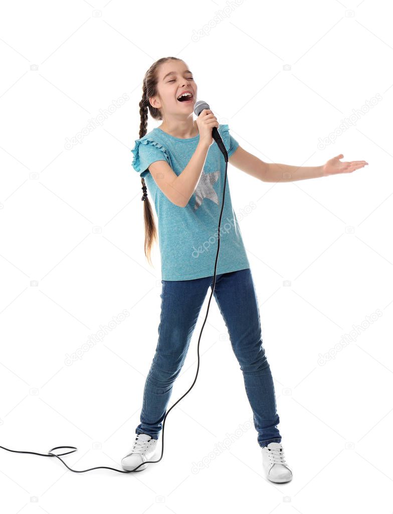 Cute girl singing in microphone on white background