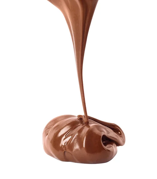 Öntés édes csokoládé krém fehér háttér — Stock Fotó