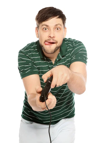 Emotional man playing video games with controller isolated on white — Stock Photo, Image