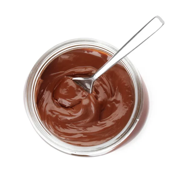 Üveg jar finom csokoládé krémmel izolált fehér kanál, felülnézet — Stock Fotó