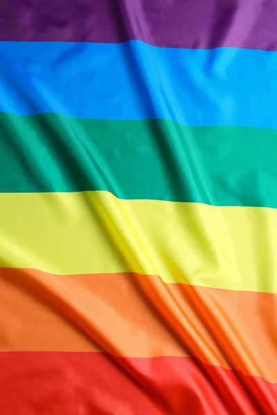 Arco-íris brilhante bandeira gay como fundo. Comunidade LGBT — Fotografia de Stock