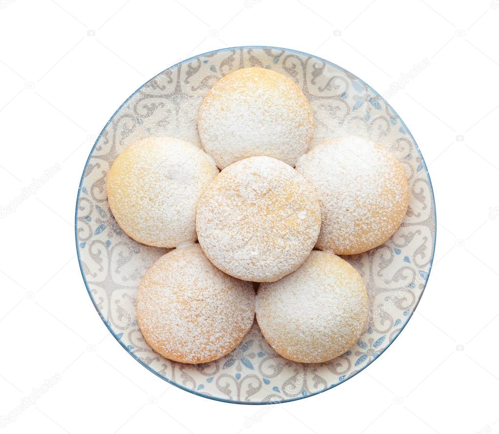 Plate with cookies for Islamic holidays isolated on white, top view. Eid Mubarak