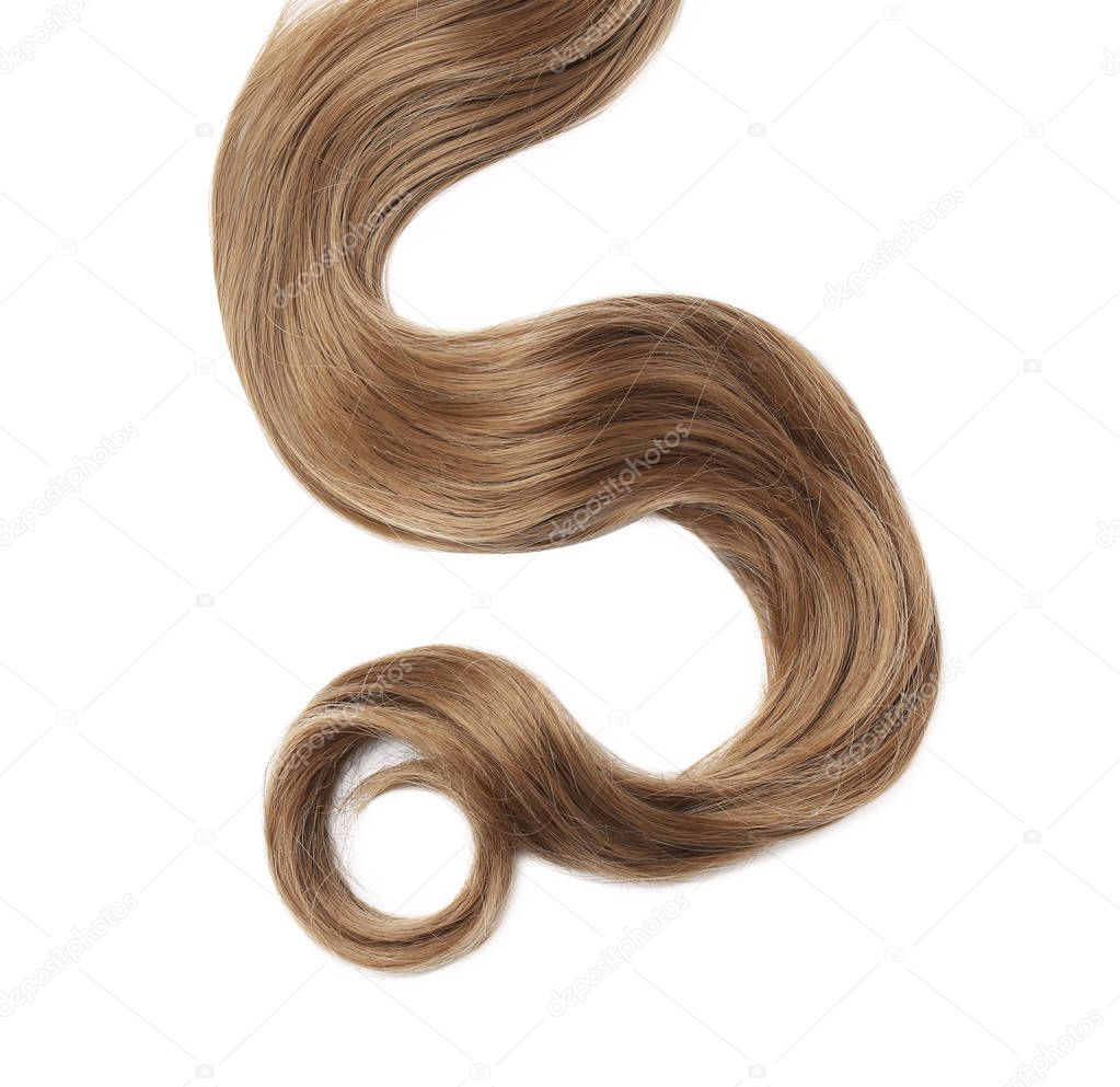 Beautiful light brown hair on white background, top view. Hairdresser service