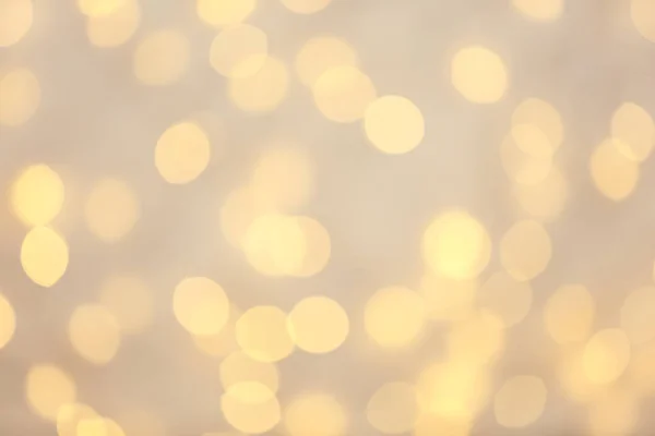 Luzes douradas bonitas como fundo. Efeito Bokeh — Fotografia de Stock