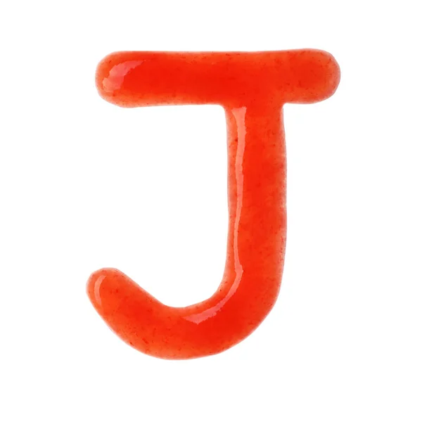 Carta J escrita com molho vermelho sobre fundo branco — Fotografia de Stock