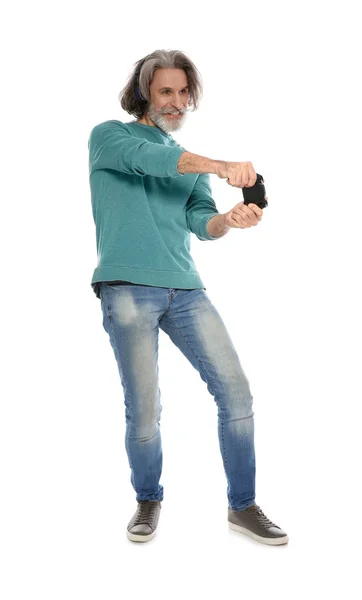 Emotional mature man playing video games with controller isolated on white — Stock Photo, Image