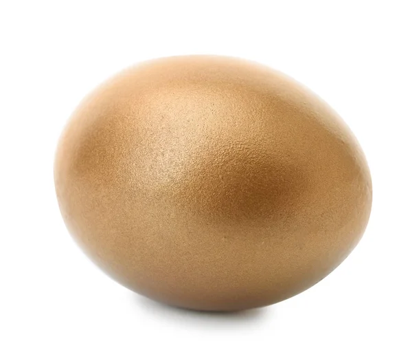 Одно блестящее золотое яйцо на белом фоне — стоковое фото
