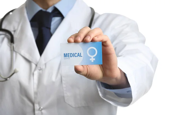 Ginecólogo sosteniendo tarjeta de visita aislado en blanco, primer plano. Servicio médico — Foto de Stock