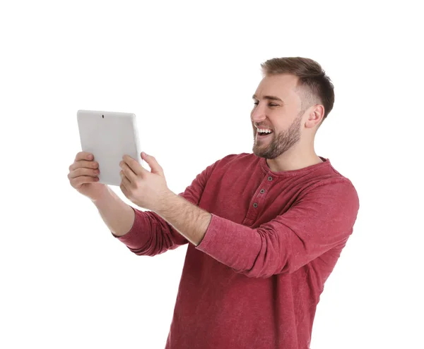 Jovem usando chat de vídeo no tablet contra fundo branco — Fotografia de Stock