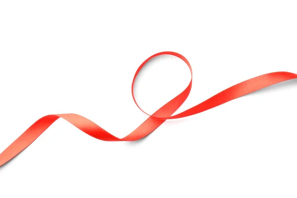 Απλή κόκκινη κορδέλα σε λευκό φόντο, επάνω όψη. Εορταστική διακόσμηση — Φωτογραφία Αρχείου