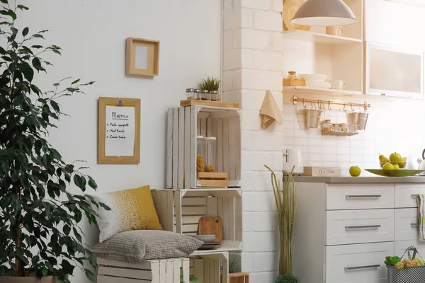 Modern kitchen interior with wooden crates as eco furniture — Stock Photo, Image