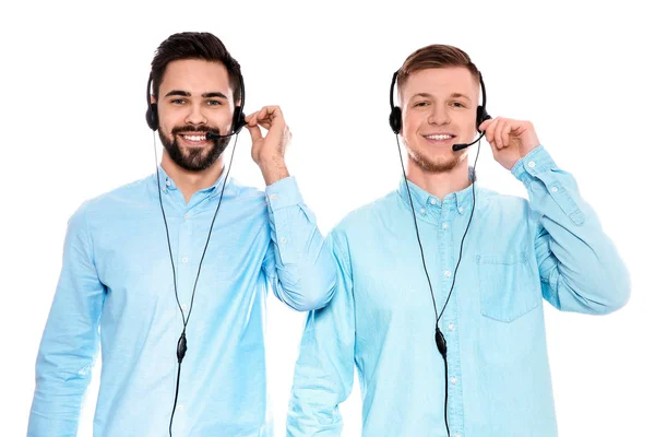 Operadores de suporte técnico com fones de ouvido isolados em branco — Fotografia de Stock