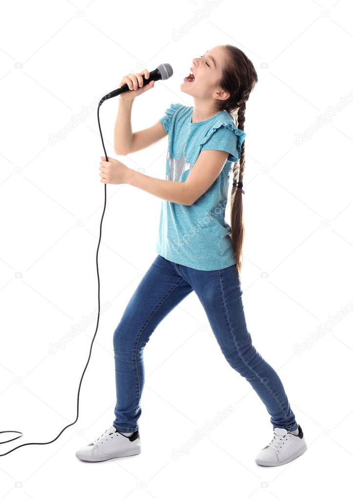 Cute girl singing in microphone on white background