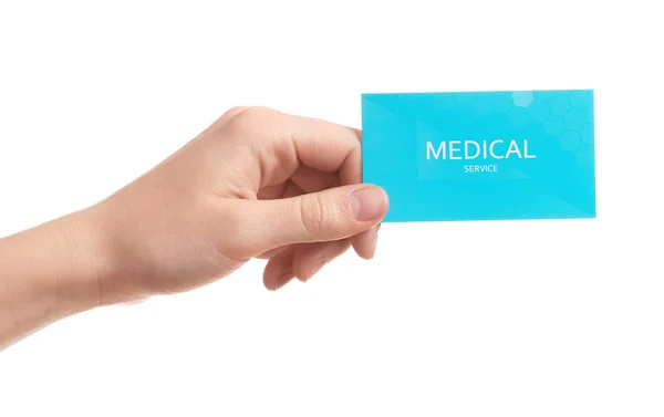 Mulher segurando cartão de visita isolado em branco, close-up. Serviço médico — Fotografia de Stock