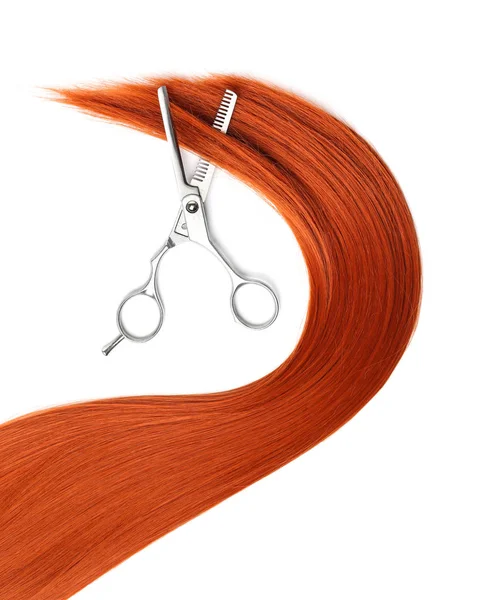 Red hair and thinning scissors on white background, top view. Hairdresser service — Stock Photo, Image