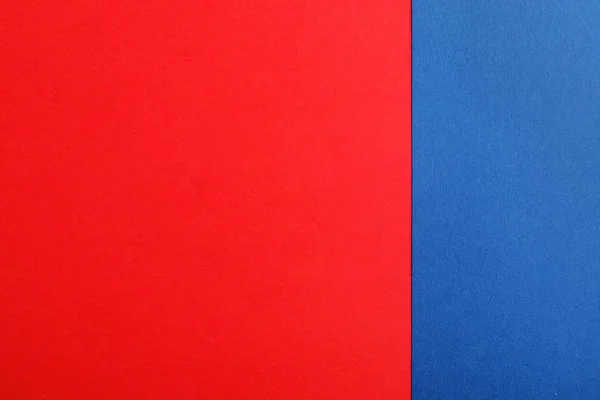 Blue and red paper sheets as colorful background, top view — Stock Photo, Image