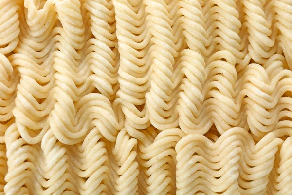 Quick cooking noodles as background, closeup view — Stock Photo, Image