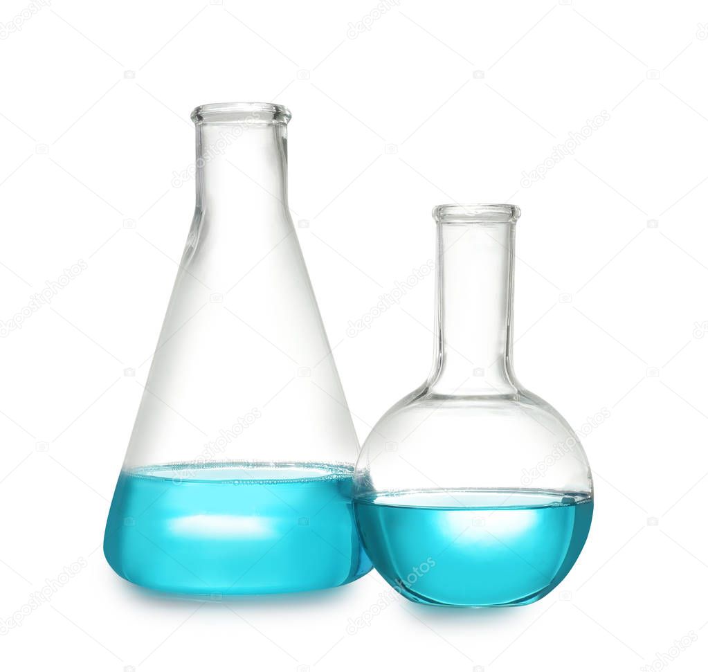 Laboratory glassware with liquid on white background. Solution chemistry