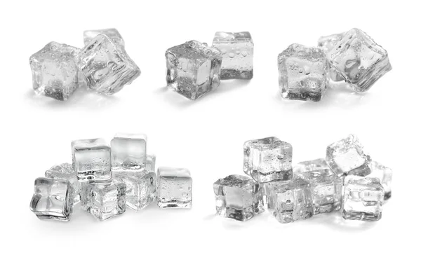 Conjunto de cubos de hielo cristalino sobre fondo blanco — Foto de Stock