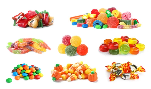 Set van verschillende smakelijke snoepjes op witte achtergrond — Stockfoto