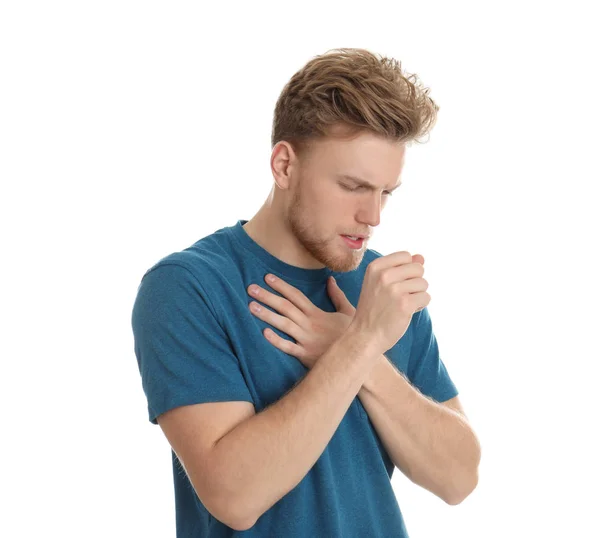 Guapo joven tosiendo sobre fondo blanco —  Fotos de Stock