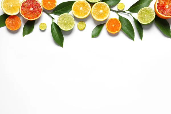 Flat lay composition with different citrus fruits on white background — Stock Photo, Image