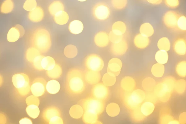 Mooie gouden lichten als achtergrond. Bokeh-effect — Stockfoto