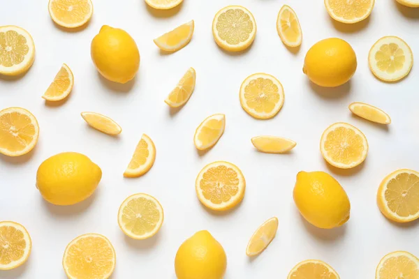Fresh lemons on white background, top view. Citrus fruits — Stock Photo, Image