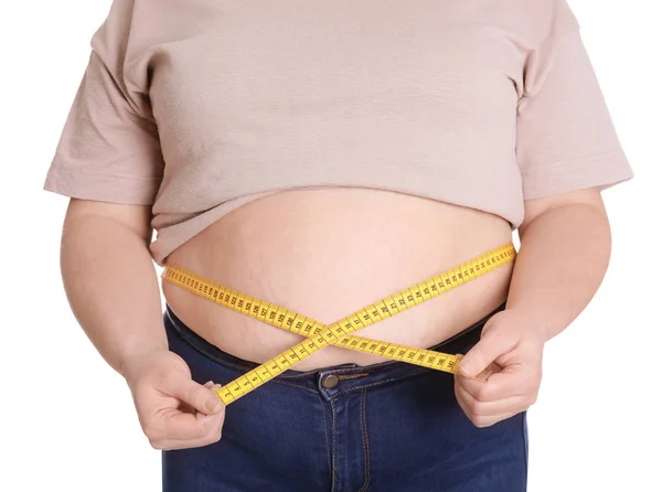 Übergewichtige Frau Taille mit Klebeband isoliert auf weiß, Nahaufnahme — Stockfoto