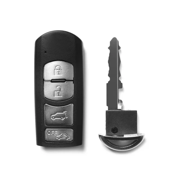 Автомобільний ключ і сигналізація дистанційного керування ізольовані на білому, вид зверху — стокове фото