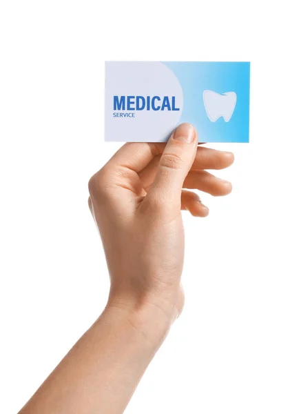 Woman holding business card isolated on white, closeup. Dental medical service — Stock Photo, Image