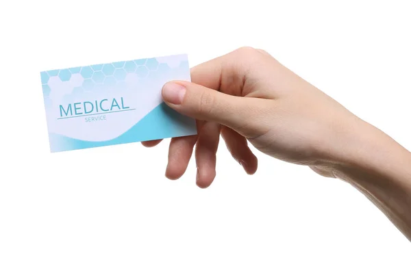 Mulher segurando cartão de visita isolado em branco, close-up. Serviço médico — Fotografia de Stock