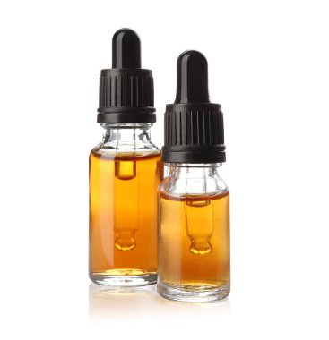 Beyaz izole uçucu yağ Şişeleri