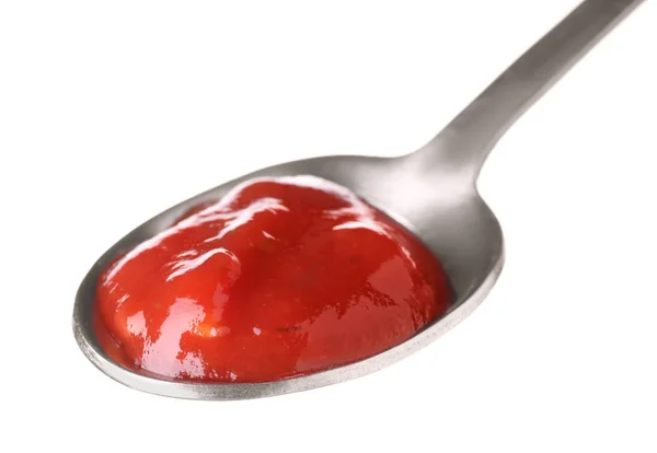 Metal spoon with red sauce on white background — Stock Photo, Image