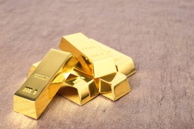 Masada parlak altın çubuklar var. Metin alanı