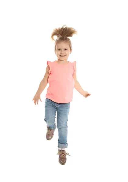 Pretty little girl jumping against white background — Stock Photo, Image