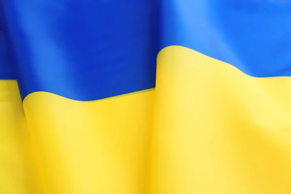 Bandeira nacional da Ucrânia como fundo, close-up — Fotografia de Stock