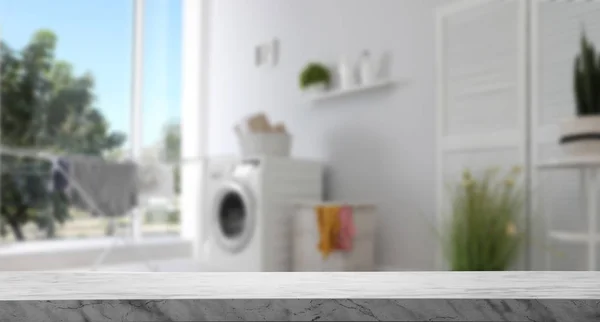 Empty marble table in laundry room. Mockup for design — Stock Photo, Image