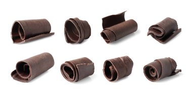 Beyaz arka planda lezzetli çikolata bukleler seti